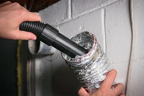 vacuuming out ductwork