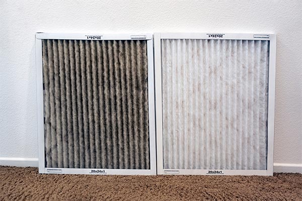 comparing a clean and a dirty air filter