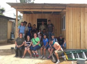 The Guatemala Group photo in front of the completed house.