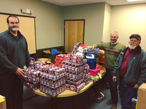 Duane and Alan presenting GHI gifts to Duane Shneck at AVL Radio